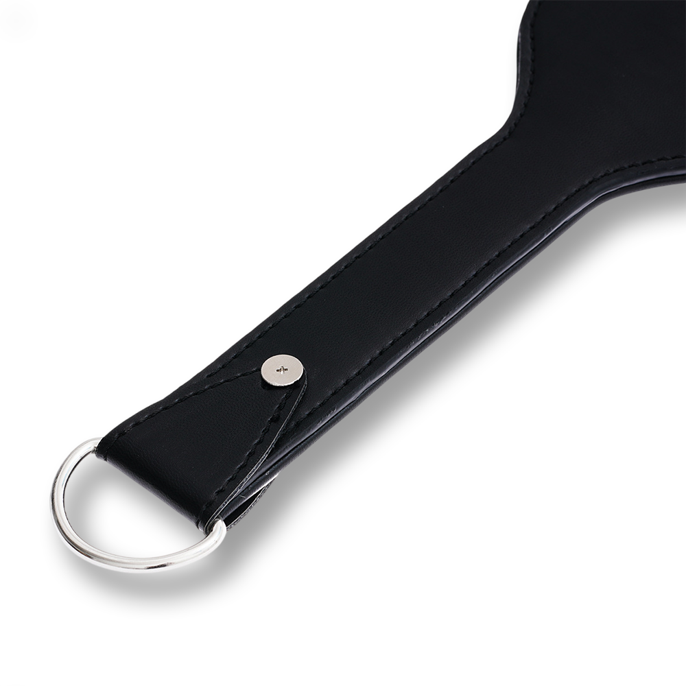 Paddle en cuir texturé