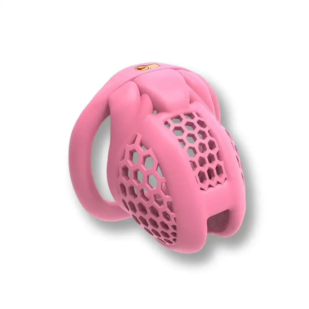 Cage de chasteté rose en silicone avec grille hexagonale pour sissification et soumission sexuelle sur Sissyshop