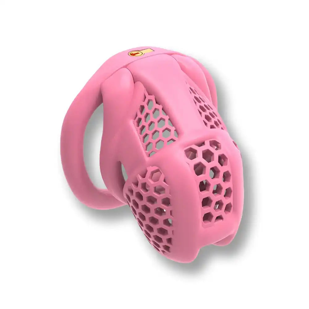 Cage de chasteté rose en silicone avec grille hexagonale pour sissification et soumission sexuelle sur Sissyshop
