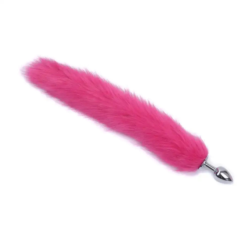 Plug anal rose en fourrure synthétique et métal pour sissification et fétichisme, idéal pour la soumission sexuelle sur Sissyshop
