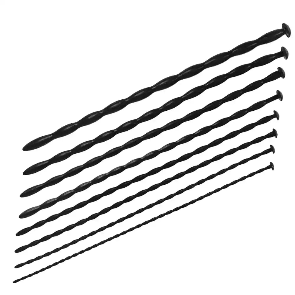 Vue d'ensemble de tous les modèles de sondes urétrales en silicone noir classés par taille et diamètre croissants.
