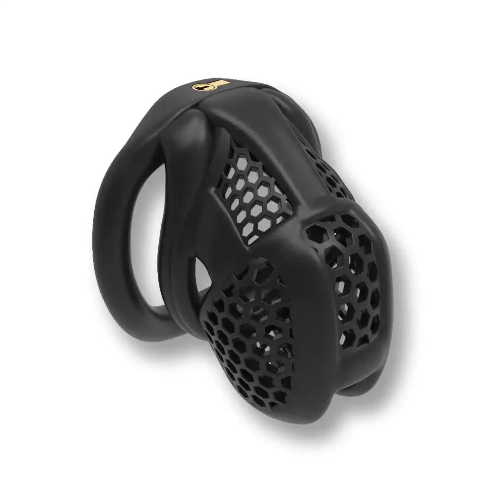 Cage de chasteté noire en silicone avec grille hexagonale pour sissification et soumission sexuelle sur Sissyshop