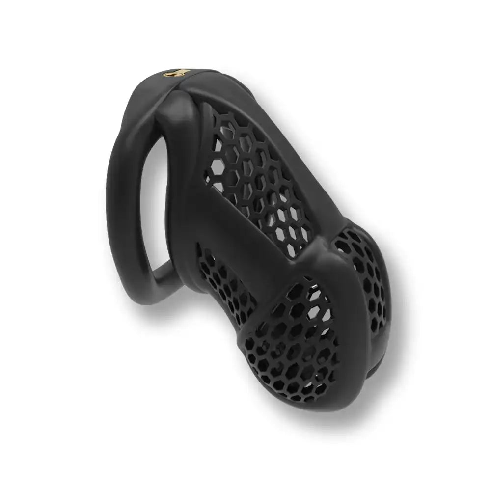 Cage de chasteté noire en silicone avec grille hexagonale pour sissification et soumission sexuelle sur Sissyshop