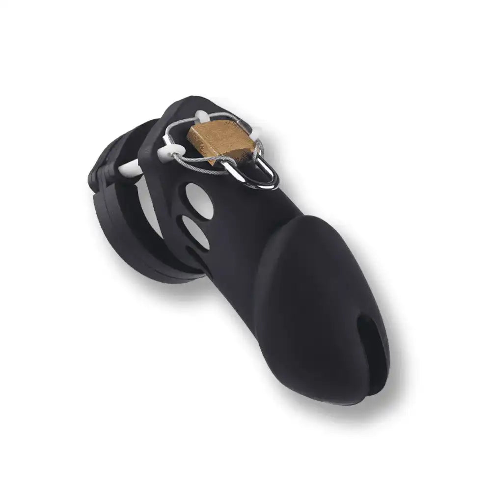 Cage de chasteté noire en silicone avec cadenas doré pour sissification et soumission sexuelle sur Sissyshop