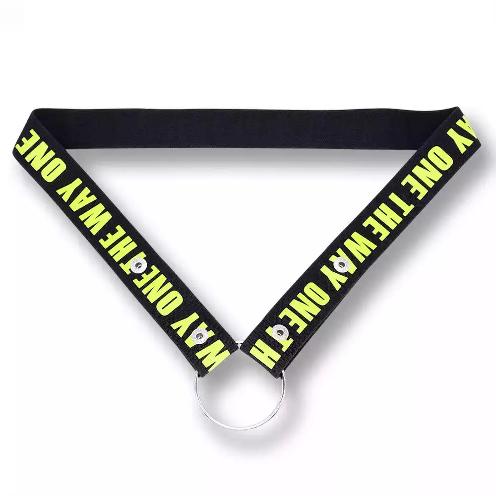 Ceinture de chasteté noire et jaune fluo The Way One en version double maintien simple, un harnais élastique réglable pour sécuriser votre cage de chasteté sur la boutique sissyshop.