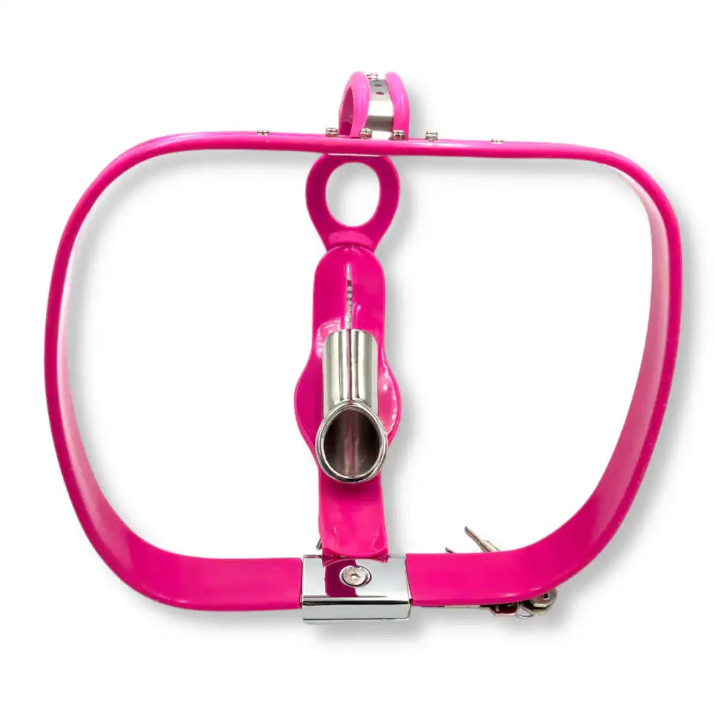 Vue de dessus montrant la structure rigide et la cage de chasteté pour homme intégrée au harnais rose, un dispositif de chasteté stricte disponible sur sissyshop.