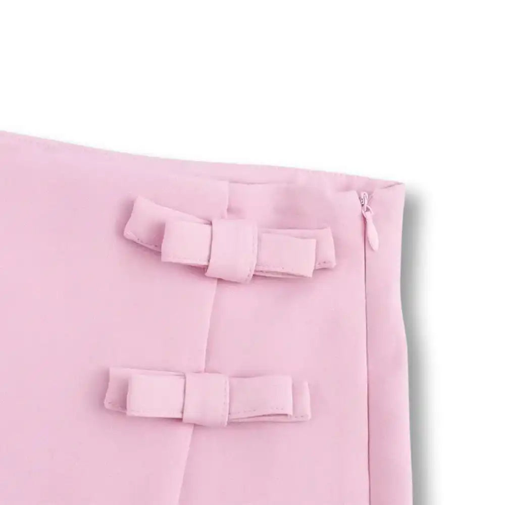 Jupe sexy rose pâle en coton avec nœuds décoratifs, idéale pour la féminisation et le crossdressing sur Sissyshop