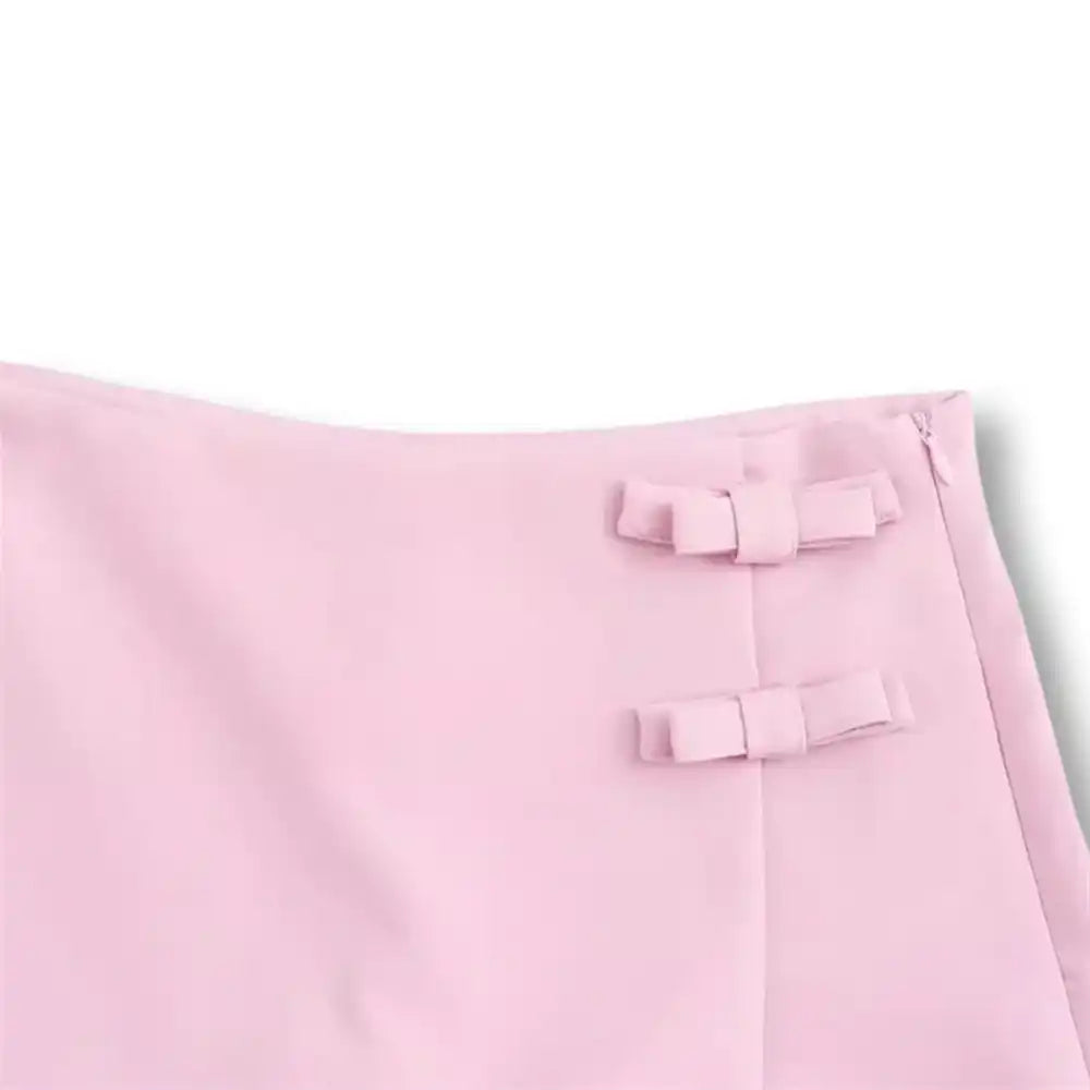 Jupe sexy rose en tissu doux avec nœuds décoratifs, idéale pour la féminisation et le crossdressing sur Sissyshop