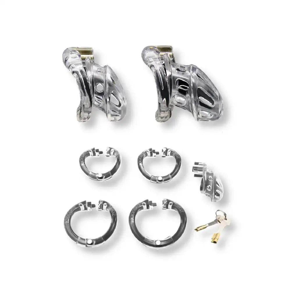 Ensemble complet incluant des cages de chasteté transparentes de tailles variées, des anneaux de base assortis et des clés de verrouillage.