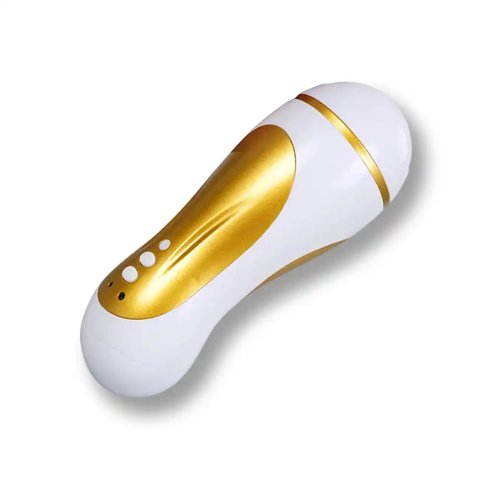 Masturbateur électrique interactif blanc et doré avec commandes de vibration, accessoire et sextoys pour homme idéal pour la sissification sur Le Sissyshop.