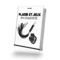 visuel de l'ebook plaisir et jeux en chasteté, on y voit le mockup de l'ebook proposé par le sissyshop avec dessus, un fouet et une cage de chasteté