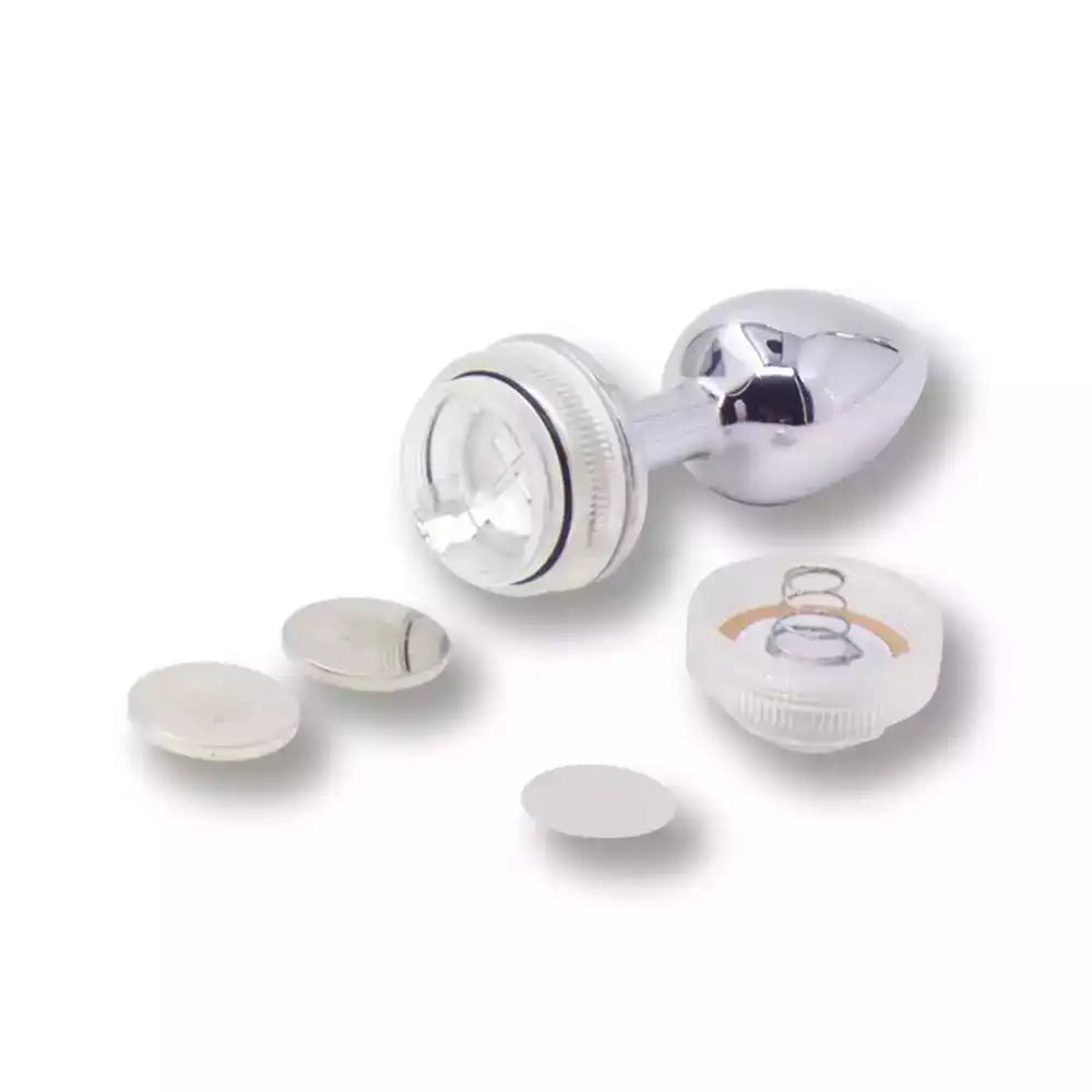 Plug anal métallique brillant avec accessoires en silicone pour sissification et soumission sexuelle sur Sissyshop