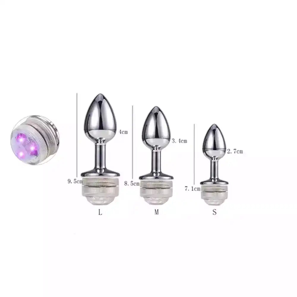 Plug anal métallique avec lumière LED rose, tailles S, M, L pour sissification et fétichisme sur Sissyshop