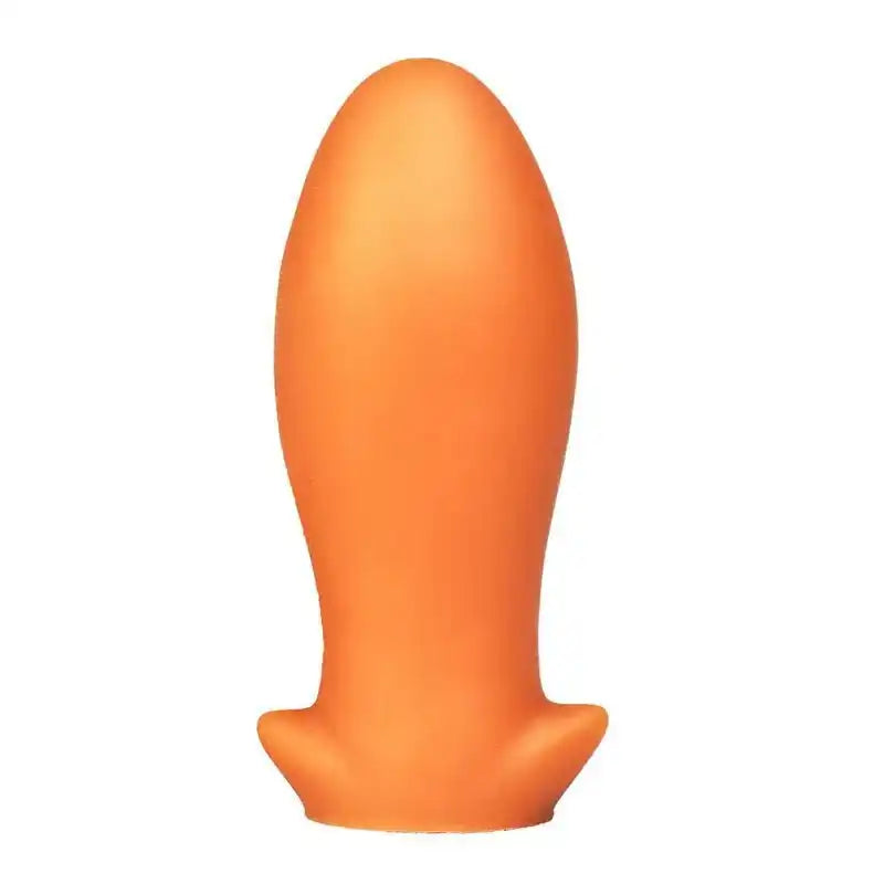 Plug anal orange de forme oblongue inspiré de la gamme Dragon Egg, disponible sur Le Sissyshop.