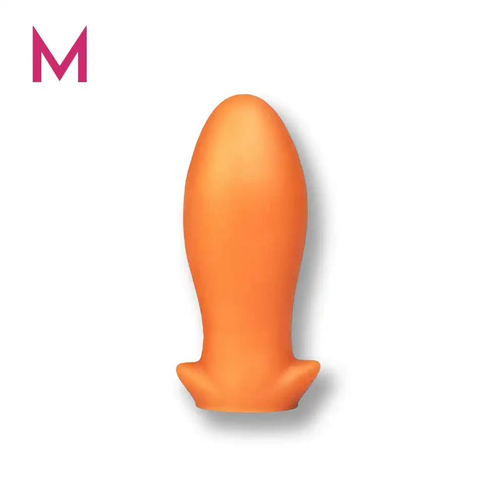 Modèle taille M du plug anal Dragon Egg en silicone orange pour des sensations confortables.