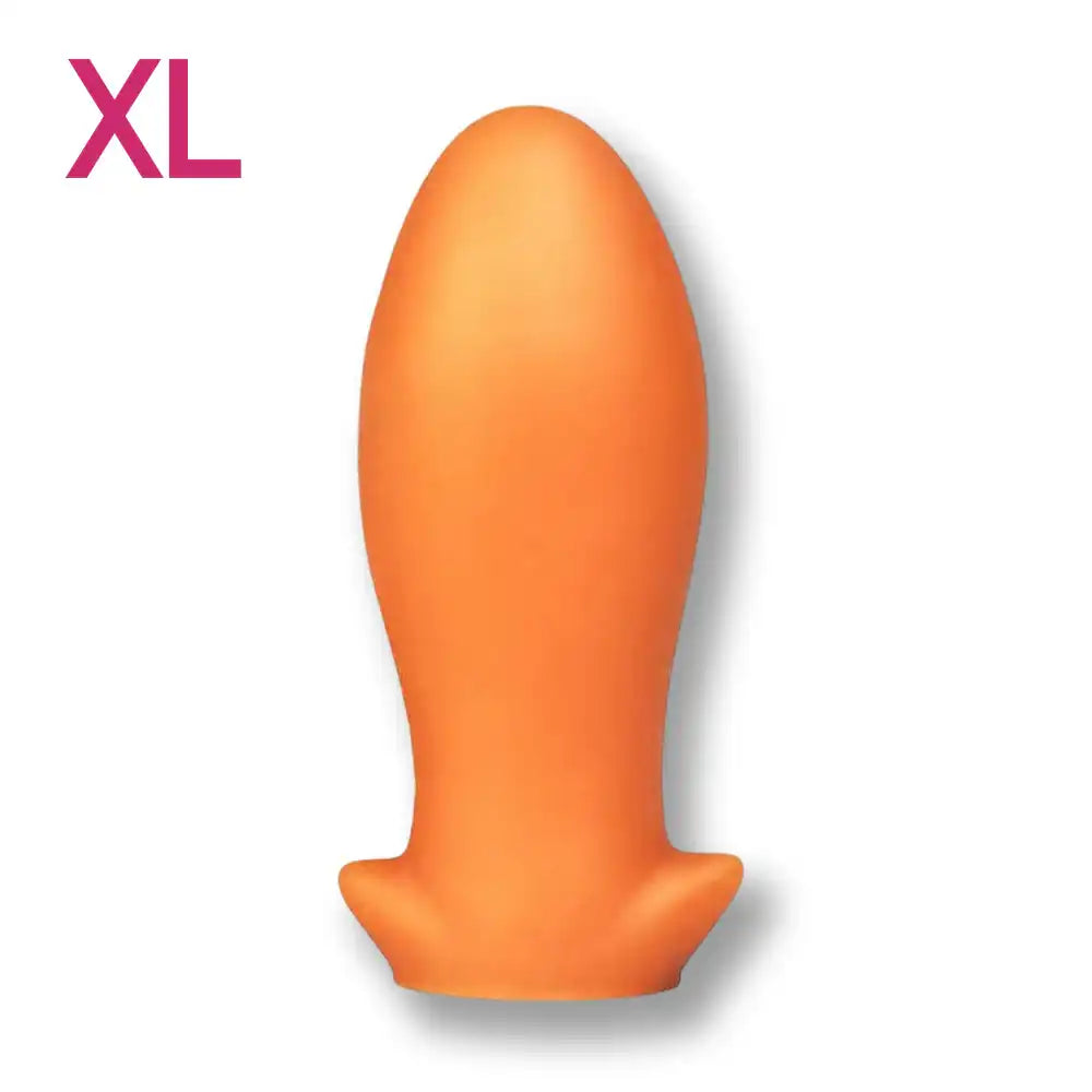 Modèle taille XL du plug anal Dragon Egg en silicone orange pour une expérience plus intense.