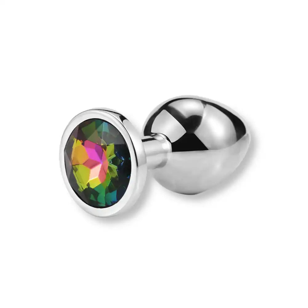 Plug anal en métal argenté doté d'un strass aux reflets multicolores, un modèle original pour varier les plaisirs et les plug anaux sur sissyshop.