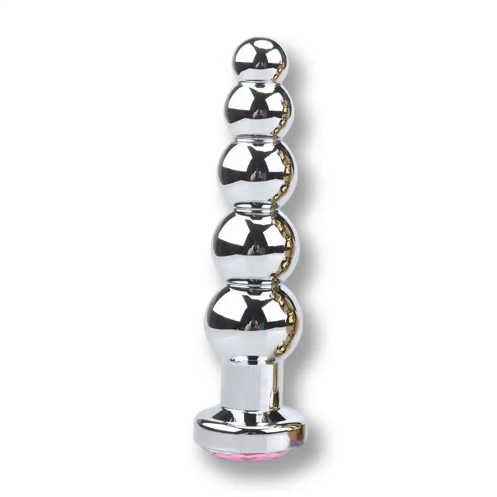 Plug anal métal argenté en forme de chapelet à perles graduées avec bijou strass rose, plug anal en métal, sissy et sissification idéal sur Le Sissyshop.