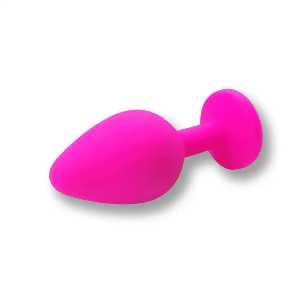 Plug anal rose vif en silicone souple pour sissification et plaisir anal, idéal pour la soumission sexuelle sur Sissyshop