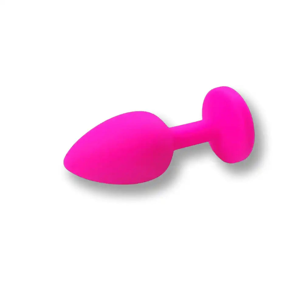 Plug anal rose vif en silicone souple pour sissification et plaisir anal, idéal pour la soumission sexuelle sur Sissyshop