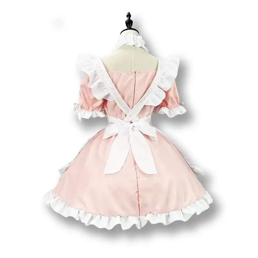 Robe rose en satin avec volants blancs pour sissification et féminisation, idéale pour le crossdressing sur Sissyshop