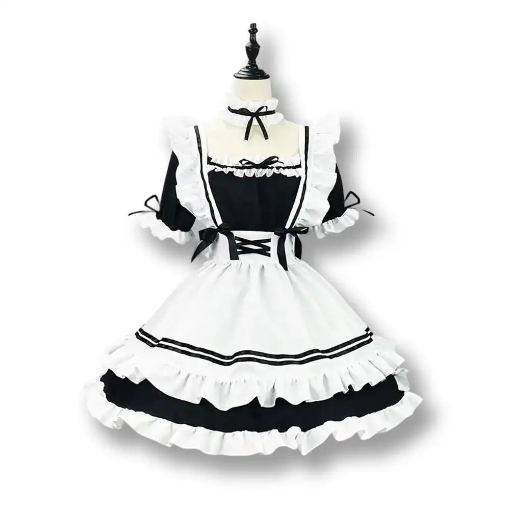 Robe de sissification en dentelle noire et blanche, idéale pour la féminisation et le crossdressing, sur Sissyshop