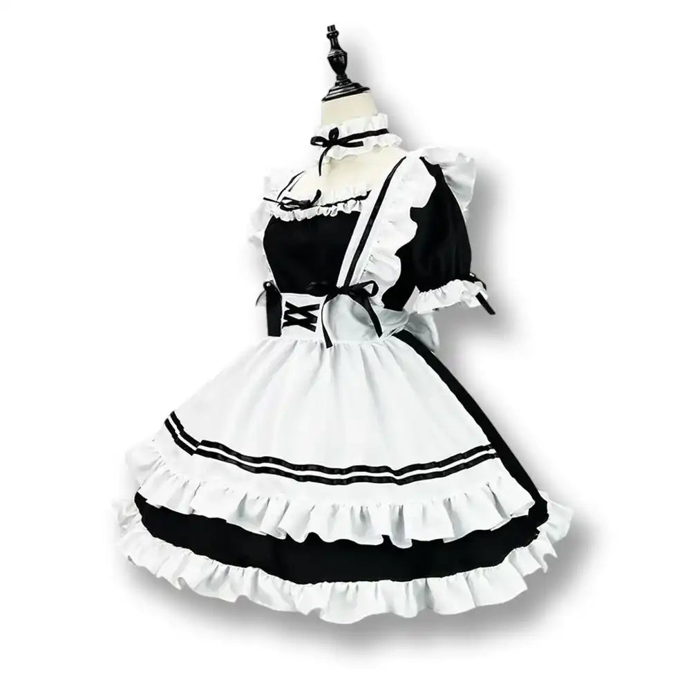 Robe de sissy en coton blanc et noir avec volants, idéale pour la féminisation et le crossdressing sur Sissyshop